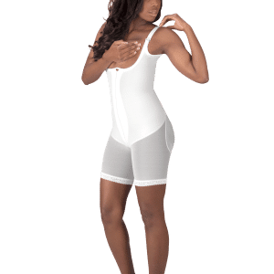 A woman poses in a white bodysuit, highlighting the non-zippered molded buttocks high-back girdle from Design Veronique.