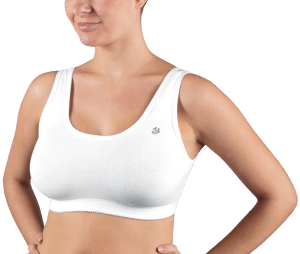 A woman models a white cotton medical sports bra by Design Veronique.